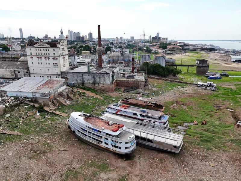 a drone view shows boats stranded on the rio negro as the river reached its lowest point in its history during the most intense and widespread drought the country has experienced since records began in 1950 in manaus amazonas state brazil october 4 2024 photo reuters