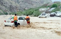 flash floods rescue workers assist stranded motorists after heavy monsoon rains inundate roads in landi kotal khyber district photo ppi