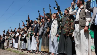 houthi supporters carry weapons as they gather in solidarity with the movement as fighting intensifies across several fronts in sanaa yemen october 7 2026 photo reuters
