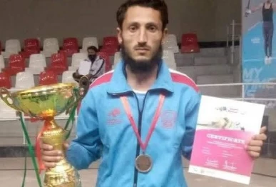 rizwan pathan with winning shields photo express