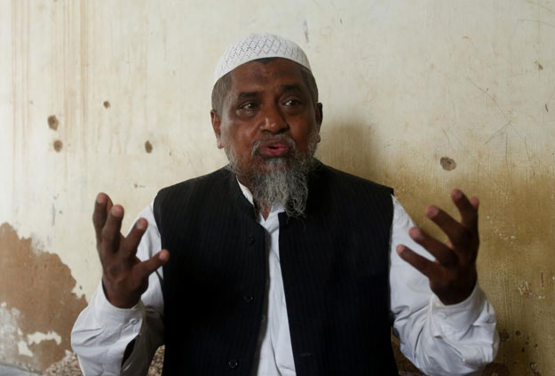 Noor Hussain Arakani, organiSer of the Rohingya Solidarity Organization (RSO) gestures during an interview at his residence in Arkanabad in Karachi, Pakistan September 7, 2017. PHOTO: REUTERS