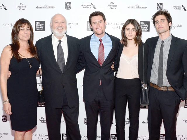 the file photo shows honoree rob reiner poses with family at the 41st annual chaplin award gala at avery fisher hall at lincoln center for the performing arts on april 28 2014 in new york city photo afp
