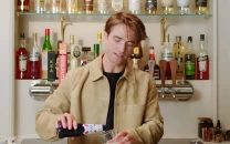 from batman to bartender robert pattinson trades spotlight for bar duty in vogue series