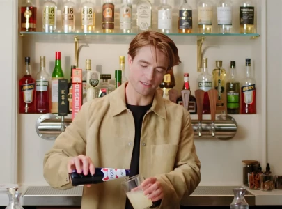 from batman to bartender robert pattinson trades spotlight for bar duty in vogue series from batman to bartender robert pattinson trades spotlight for bar duty in vogue series