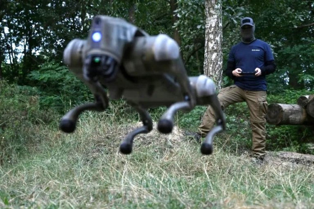 a robot dog leaps into the air controlled by its operator in ukraine photo afp a robot dog leaps into the air controlled by its operator in ukraine photo afp