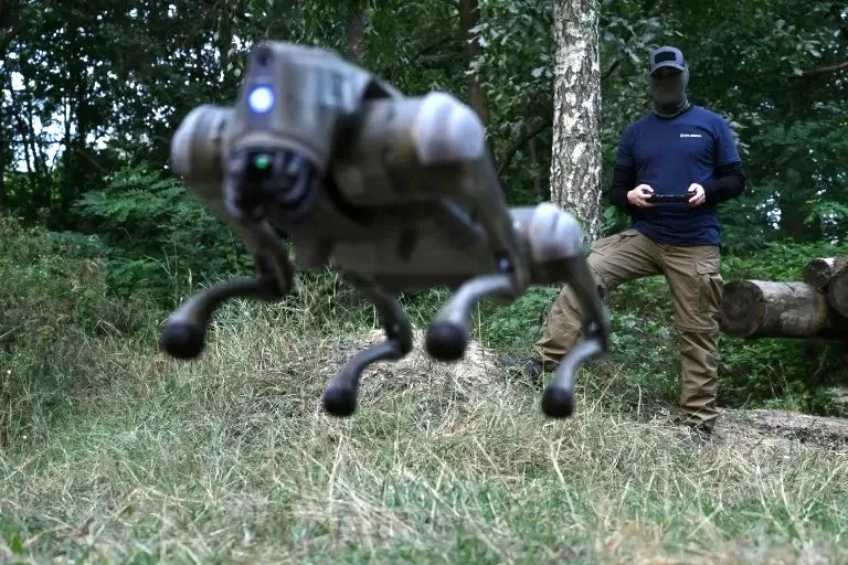 a robot dog leaps into the air controlled by its operator in ukraine photo afp a robot dog leaps into the air controlled by its operator in ukraine photo afp