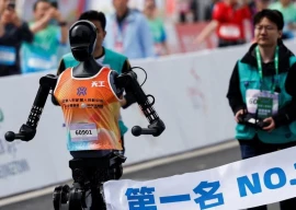 robots join thousands in beijing half marathon to showcase china s tech robots join thousands in beijing half marathon to showcase china s tech
