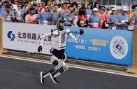 tiangong ultra 2026 humanoid robot takes part during the second beijing e town half marathon and humanoid robot half marathon in beijing china april 19 2026 reuters