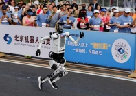 tiangong ultra 2026 humanoid robot takes part during the second beijing e town half marathon and humanoid robot half marathon in beijing china april 19 2026 reuters