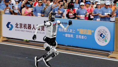 tiangong ultra 2026 humanoid robot takes part during the second beijing e town half marathon and humanoid robot half marathon in beijing china april 19 2026 reuters