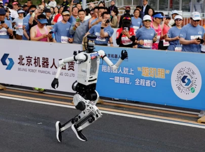 humanoid robots race past humans in beijing half marathon showing rapid advances