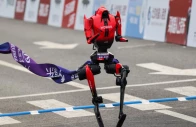 a lightning humanoid robot by honor crosses the finish line of the second beijing e town half marathon and humanoid robot half marathon in beijing china april 19 2026