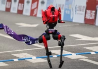 a lightning humanoid robot by honor crosses the finish line of the second beijing e town half marathon and humanoid robot half marathon in beijing china april 19 2026