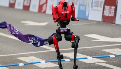 a lightning humanoid robot by honor crosses the finish line of the second beijing e town half marathon and humanoid robot half marathon in beijing china april 19 2026
