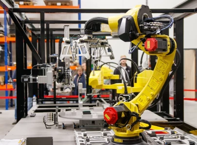 industrial robots working in factories surpass 5m worldwide