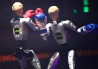 robots wear boxing gloves as they exchange punches during the ultimate fighting bots ufb competition at the battlebots arena on the sidelines of the annual consumer electronics show ces in las vegas nevada on january 6 2026 afp