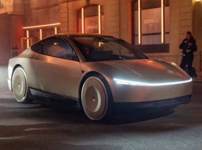 tesla unveils robot vacuum cleaner for robotaxi