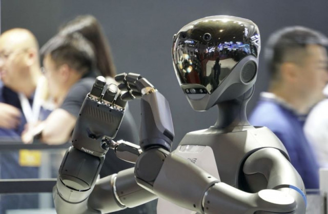 chinese robot makers race to compete with tesla in developing humanoid workers chinese robot makers race to compete with tesla in developing humanoid workers