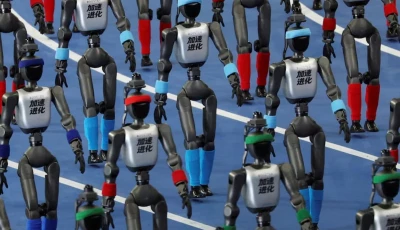 booster robotics humanoid robots walk in formation during the opening ceremony for the second world humanoid robot games at the national speed skating oval in beijing china august 22 2026 photo reuters