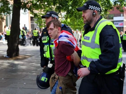 over 1 000 detained after uk riots say police