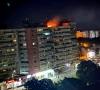 a fire burns on the roof of a 10 story block of flats after a drone crashed into the building causing an explosion and injuring two people near the border with ukraine in galati romania in this handout image released on may 29 2026 photo romanian department for emergency situations via reuters