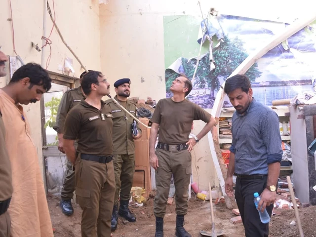 dpo hafizabad atif nazir inspects the site of a roof collapse in the farooq e azam area of sukheke mandi photo express dpo hafizabad atif nazir inspects the site of a roof collapse in the farooq e azam area of sukheke mandi photo express