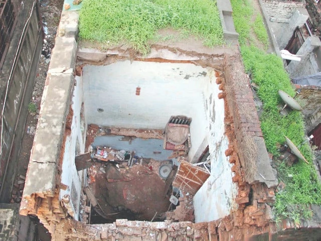a house roof collapses in lahore s railway colony after relentless downpour batters the metropolis photo ppi