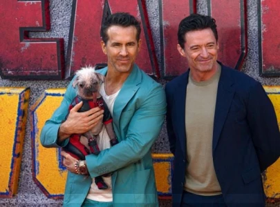 ryan reynolds and hugh jackman express interest in teaming up with tom holland s spider man