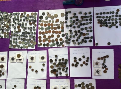 monsoon floods uncover ancient coins artifacts in dg khan