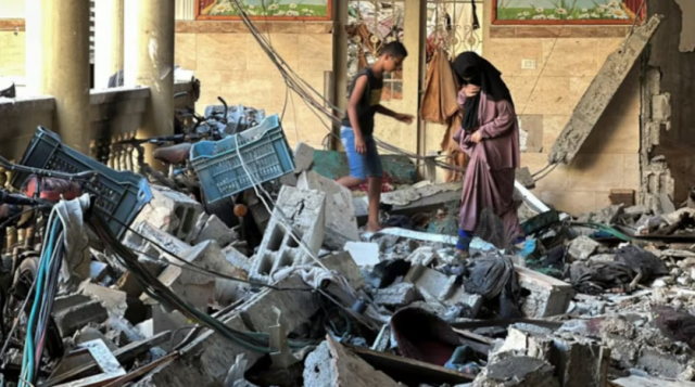 palestinians inspect the site of an israeli strike on a school sheltering displaced people amid the israel hamas conflict in gaza city august 10 2024 photo reuters palestinians inspect the site of an israeli strike on a school sheltering displaced people amid the israel hamas conflict in gaza city august 10 2024 photo reuters