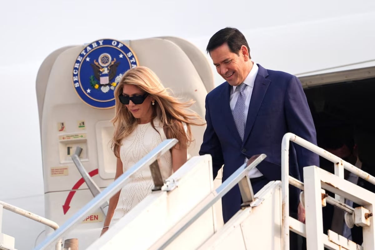 US Secretary of State Marco Rubio disembarks his plane with his wife Jeanette at Netaji Subhash Chandra Bose International Airport in Kolkata, India, Saturday, May 23, 2026. Reuters