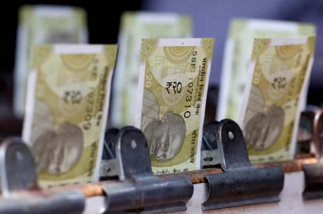 indian rupee closes at record low amid equity tax hike concerns indian rupee closes at record low amid equity tax hike concerns