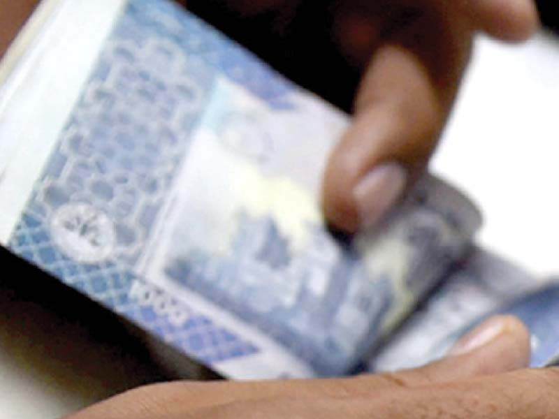 the imf has asked pakistan to end state control of the rupee photo file