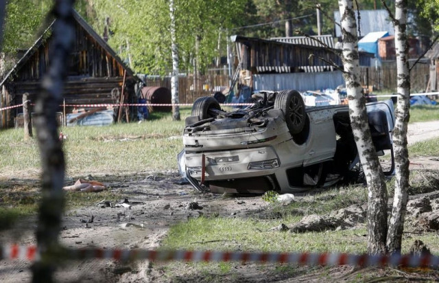 a view shows a damaged white audi q7 car lying overturned on a track next to a wood after russian nationalist writer zakhar prilepin was allegedly wounded in a bomb attack in a village in the nizhny novgorod region russia may 6 2023 photo reuters a view shows a damaged white audi q7 car lying overturned on a track next to a wood after russian nationalist writer zakhar prilepin was allegedly wounded in a bomb attack in a village in the nizhny novgorod region russia may 6 2023 photo reuters