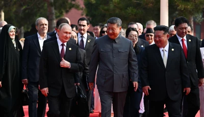 in this pool photograph distributed by the russian state agency sputnik l r russia s president vladimir putin walks with china s president xi jinping and north korea s leader kim jong un before a military parade marking the 80th anniversary of victory over japan and the end of world war ii in beijing s tiananmen square on september 3 2025 photo afp
