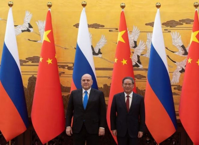 russia china seal economic pacts amid western criticism russia china seal economic pacts amid western criticism
