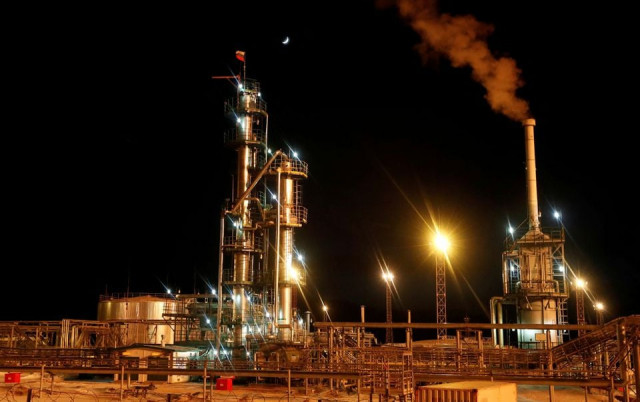 a russian state flag flies on the top of a diesel plant in the yarakta oil field owned by irkutsk oil company ink in irkutsk region russia march 10 2019 photo reuters file a russian state flag flies on the top of a diesel plant in the yarakta oil field owned by irkutsk oil company ink in irkutsk region russia march 10 2019 photo reuters file