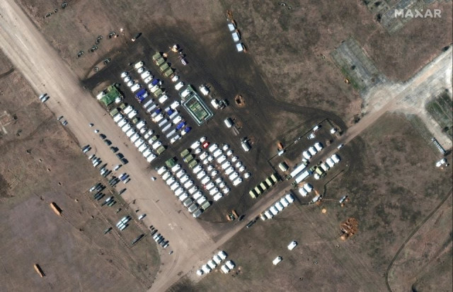 a satellite image shows a close up of troops and equipment at oktyabrskoye air base crimea february 10 2022 2022 photo reuters a satellite image shows a close up of troops and equipment at oktyabrskoye air base crimea february 10 2022 2022 photo reuters