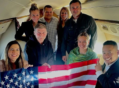 russia frees retired us schoolteacher