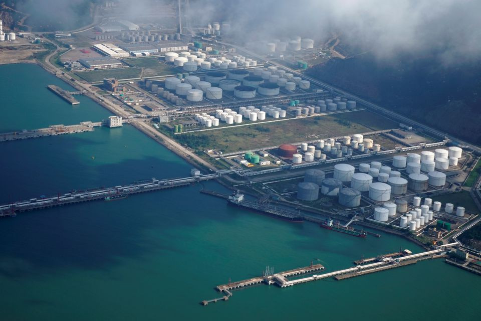 oil and gas tanks are seen at an oil warehouse at a port in zhuhai china october 22 2018 photo reuters