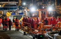 survivors of the sinking of russian cargo ship ursa major stand on the deck of a spanish maritime rescue ship upon arrival at the port of cartagena spain december 23 photo reuters