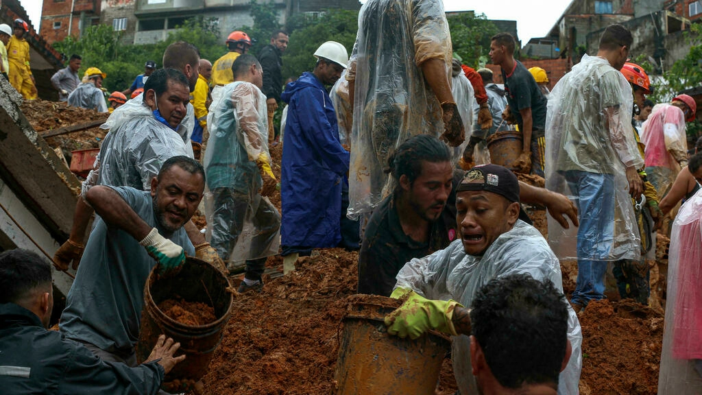 floods and landslides triggered by torrential rains have killed at least 24 people including eight children in the state of sao paulo brazil s industrial hub and home to 46 million people afp