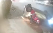 delivery rider critically hurt as speeding car overturns at khayaban e ittehad