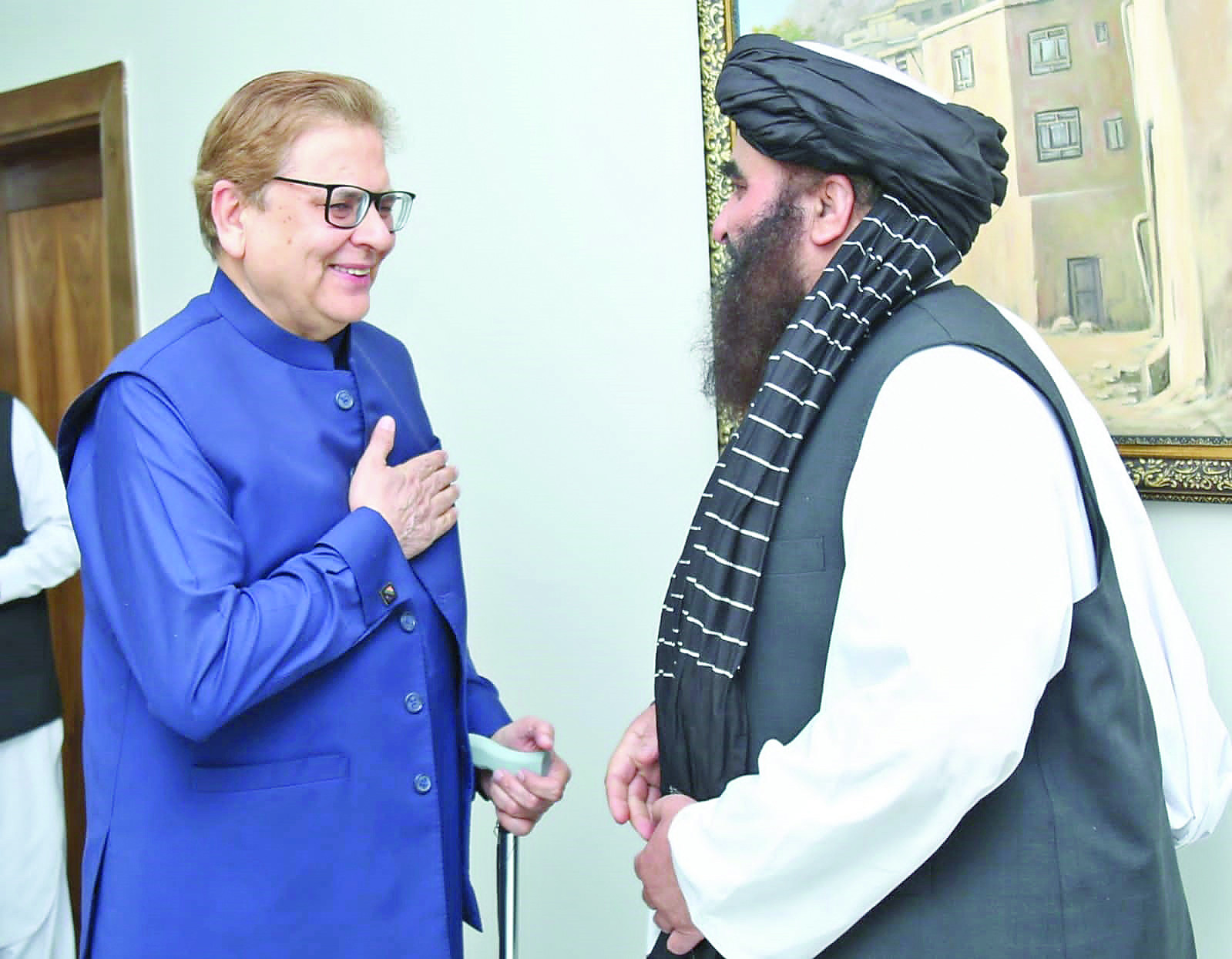 afghan foreign minister amir khan muttaqi greets pakistan s special envoy for afghanistan ambassador muhammad sadiq ahead of a meeting in kabul photo express