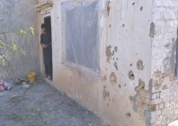 a man looks at his damaged home in landi kotal khyber tribal district of k p photo afp a man looks at his damaged home in landi kotal khyber tribal district of k p photo afp