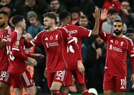 liverpool s mohamed salah r celebrates scoring the opening goal during the english premier league match with aston villa at anfield in liverpool photo afp
