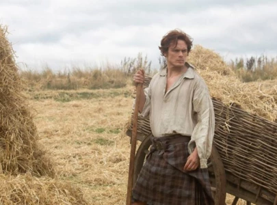 sam heughan debuts buzz cut ahead of outlander final season