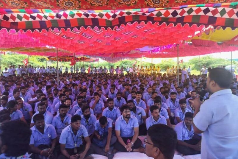 workers of a samsung facility listen to a speaker during a strike to demand higher wages at its sriperumbudur plant near the city of chennai india september 10 2024 photo reuters