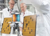 german chancellor friedrich merz looks at a satellite system in berlin photo afp