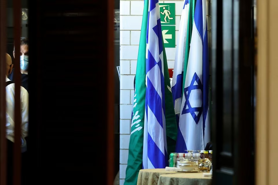 flags of saudi arabia and israel stand together in a kitchen staging area as us secretary of state antony blinken holds meetings at the state department in washington us october 14 2021 photo reuters file